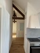 Erstbezug! 3-Zimmer-Wohnung in neu ausgebautem Spitzboden - mit EBK, Loggia und Klimaanlage - Flur/ Eingangsbereich